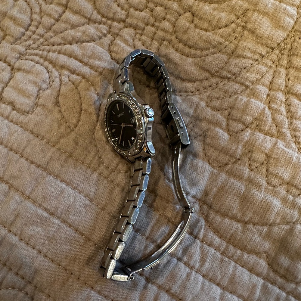 Seiko Watch - Women's Stainless Steel - SUR877
Color: Silvr Tone